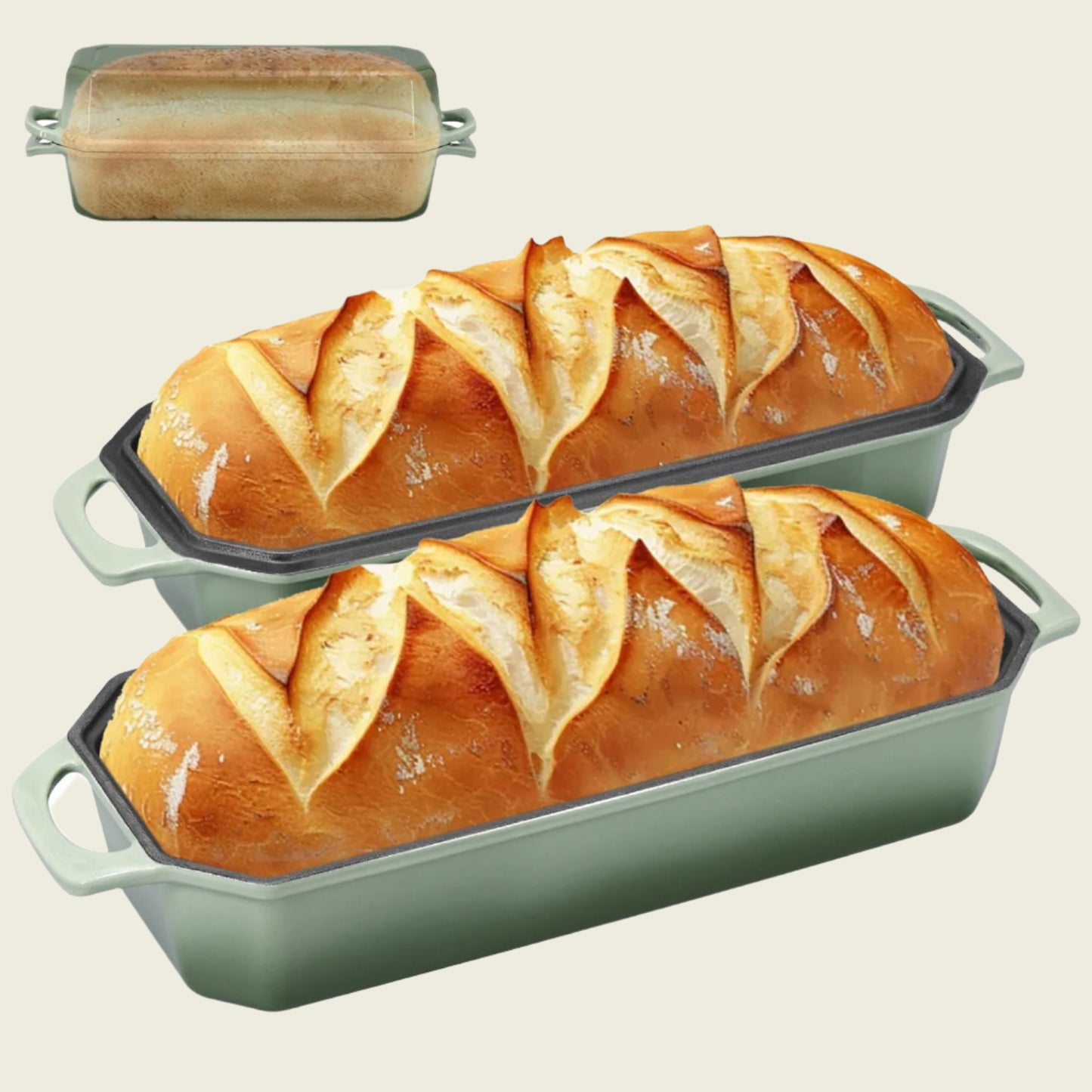 Two enameled cast iron bread loaf pans with baked bread loaves on a white background