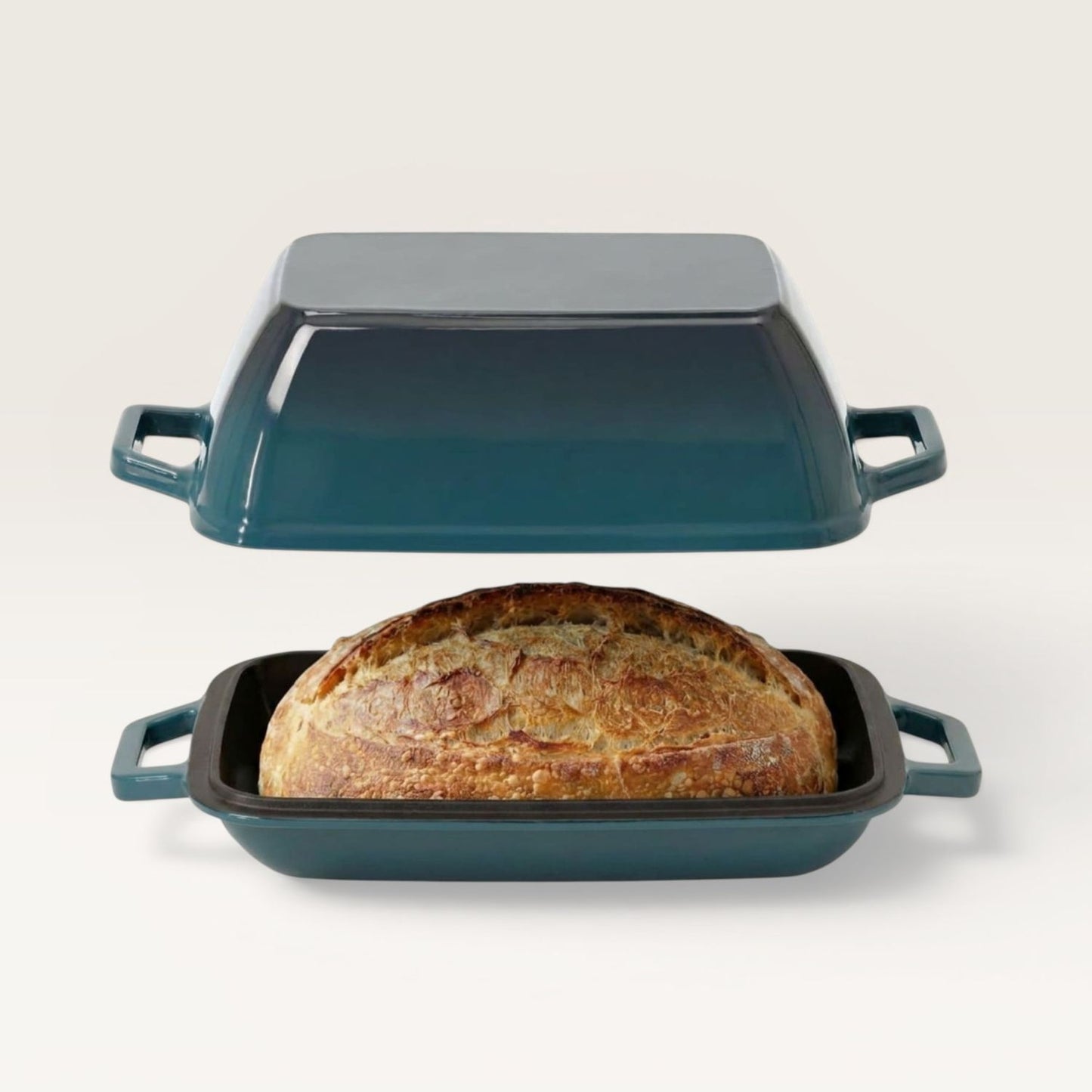 Oval bread oven set, teal base with baked loaf and matching lid