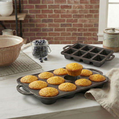 Muffin baking tray filled with golden muffins, round cups in a black mold