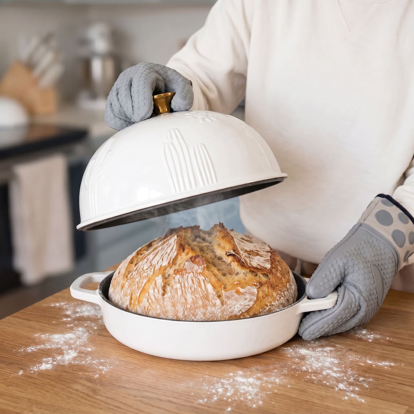 Cactus Bread Oven in Pearl White with lid on a baked loaf Pearl White