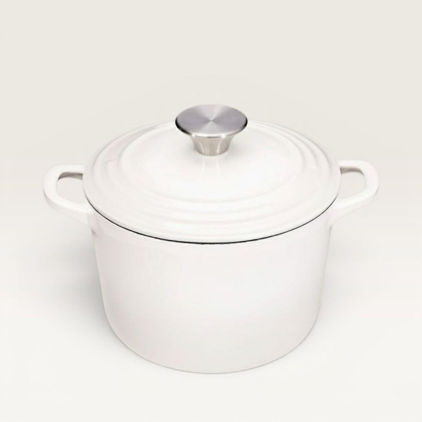 White Dutch oven with white lid and metal knob, side handles, lid on