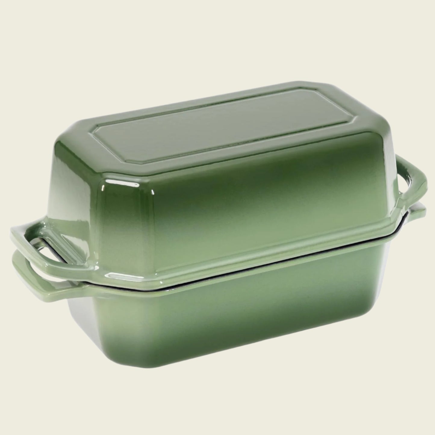 Green rectangular baking dish with lid on a white background