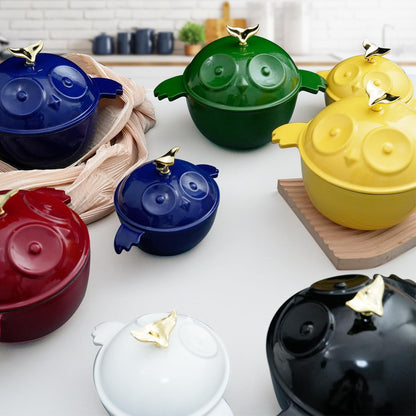 Owl-shaped cocottes set in blue, green, red, yellow, white and black with enamel finish