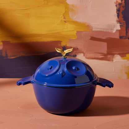 Glossy blue owl-shaped cocotte with gold knob, owl-face lid, and side handles